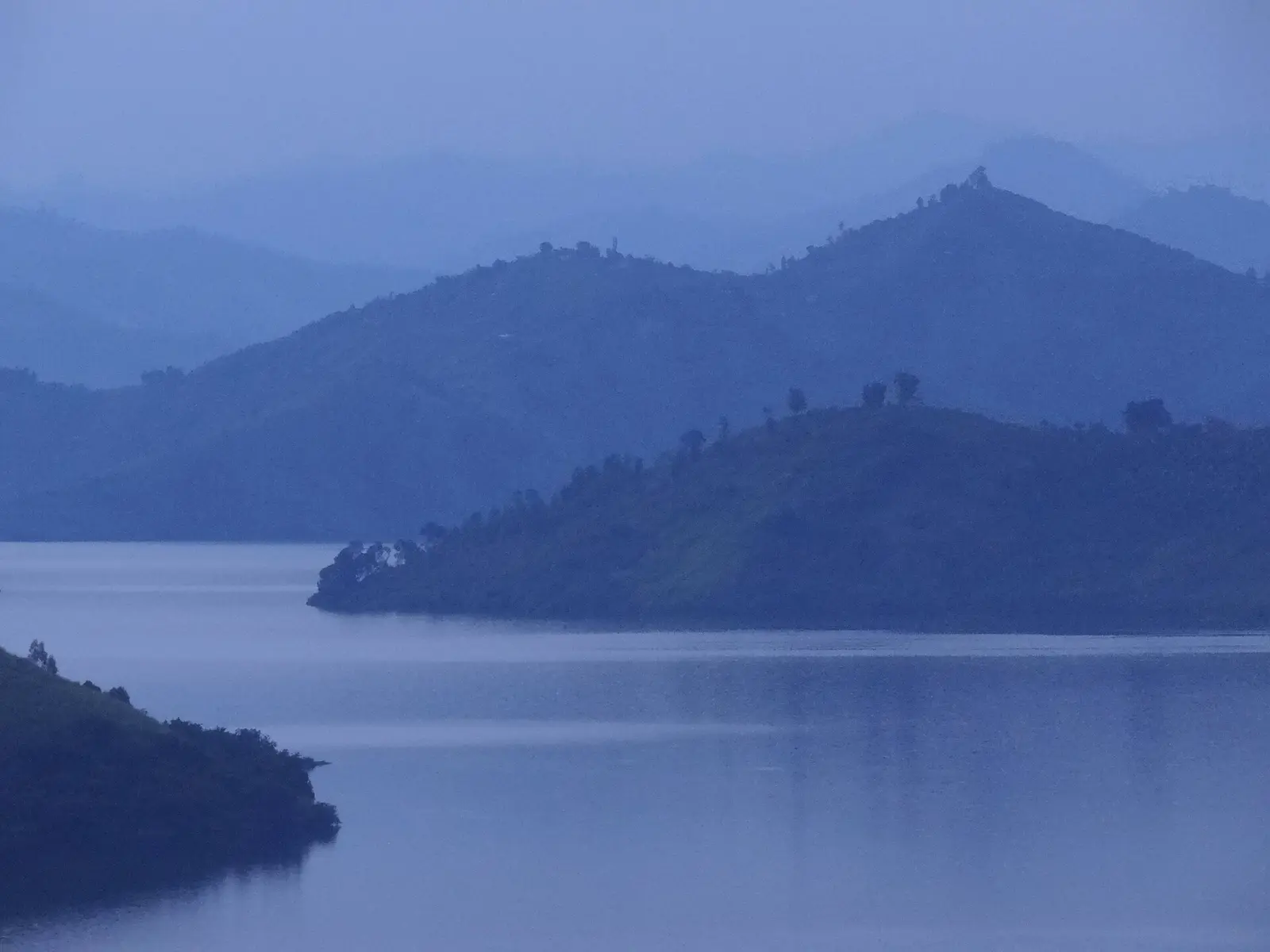 Hills and islands of Lake Kivu at dusk near Kibuye (Karongi)