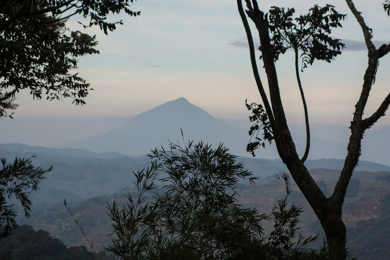 Silhouette of Muhabura volcano at dusk from northern Rwanda
